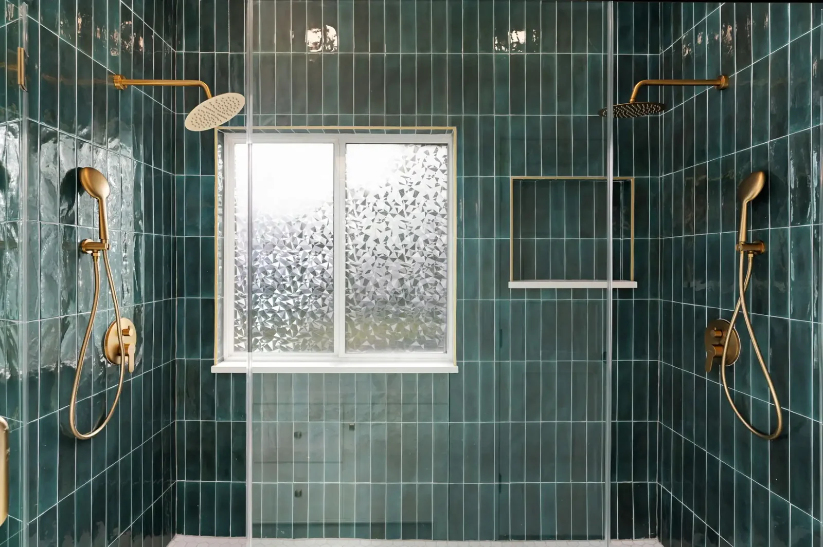 Double walk-in shower in vertical green gloss tile with brass fittings &mdash; Bremner remodel in Austin by Bailey & Bear Construction